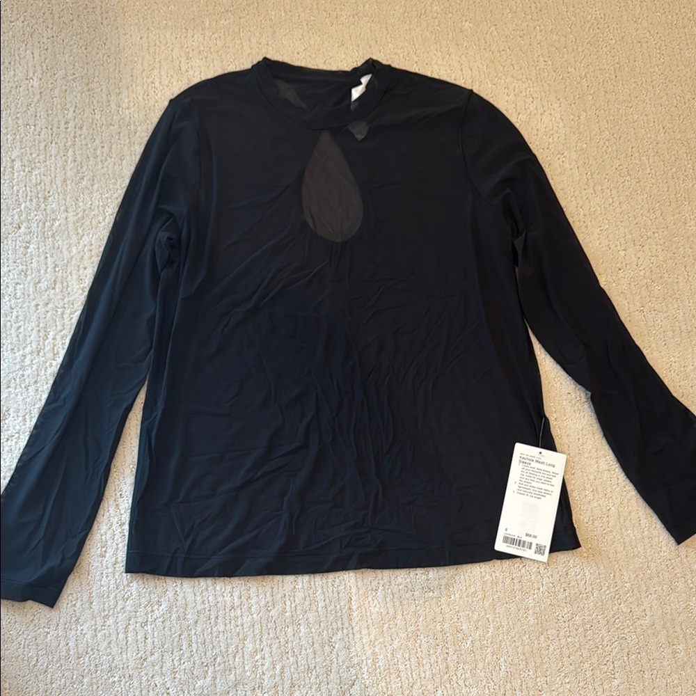 Lululemon keyhole mesh long sleeve. New with tags. Size 8. Black.